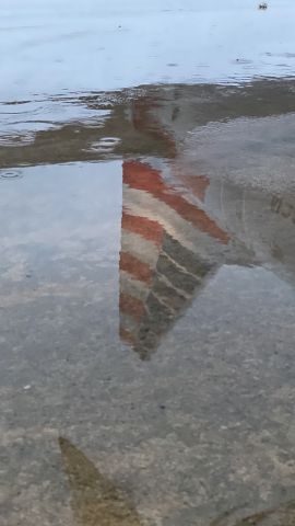Embraer 175 (N201NN) - Rainy reflections