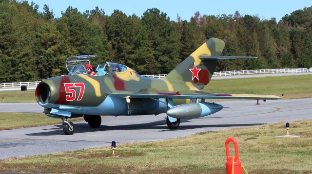 PZL-MIELEC SBLiM-2 (NX157GL) - A Red Star Aero Mikoyan Gurevich MiG-15 UTI taxiing after arriving during Aviation Career Day 2022 at St. Clair County Airport, Pell City, AL - October 8, 2022.