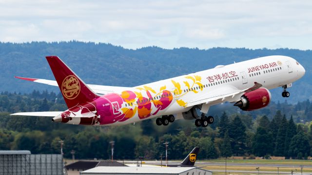 Boeing 787-9 Dreamliner (B20D1) - Juneyao's newest 787-9 with a colorful livery departing KPDX as BOE984 Heavy.