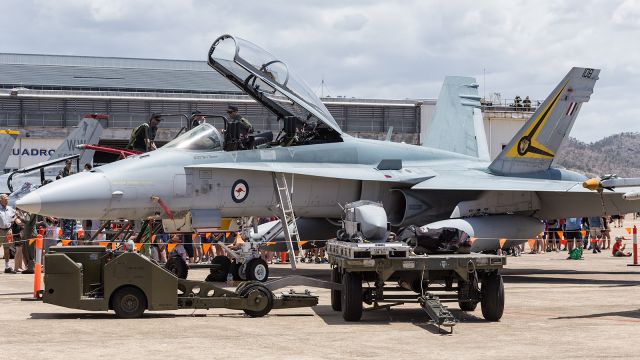 McDonnell Douglas FA-18 Hornet (A21108) - RAAF, F-18 Classic, on static display along with some of its armament in front.