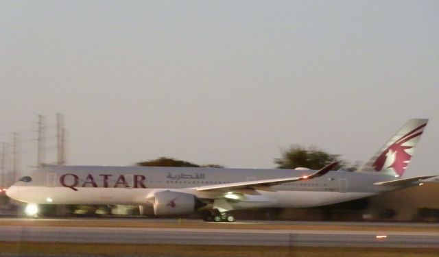 Airbus A350-900 (A7-ALP) - The Sleek and Elegant Qatar Airways A350-900 XWB.Departing for the flight for Doha