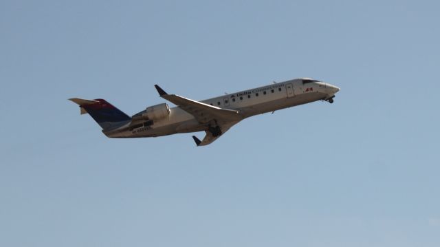 Canadair Challenger (N884AS) - Taking off of 27L at ATL on 02/25/2011