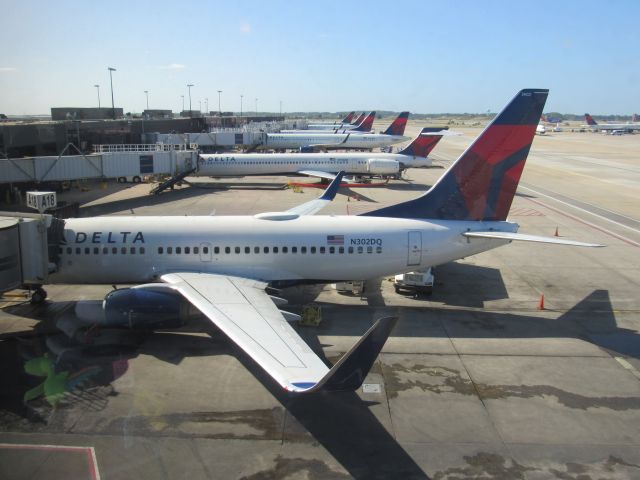 Boeing 737-700 (N302DQ) - A row of Delta Air Lines tails at Atlanta Hartsfield-Jackson Airport on 09/21/2019.