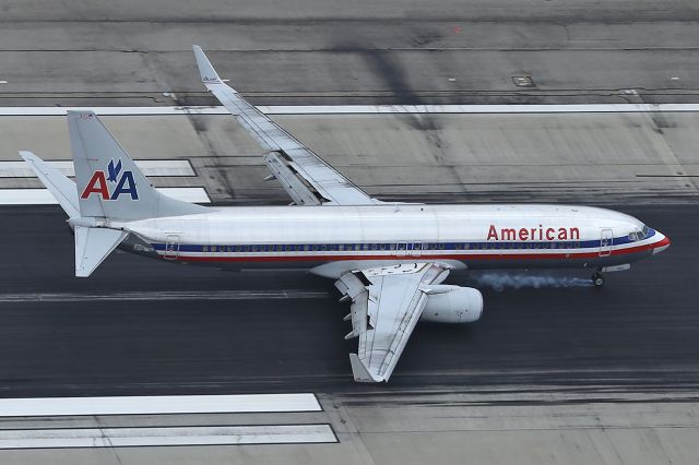 Boeing 737-800 (N908AN) - Touchdown at LAX.