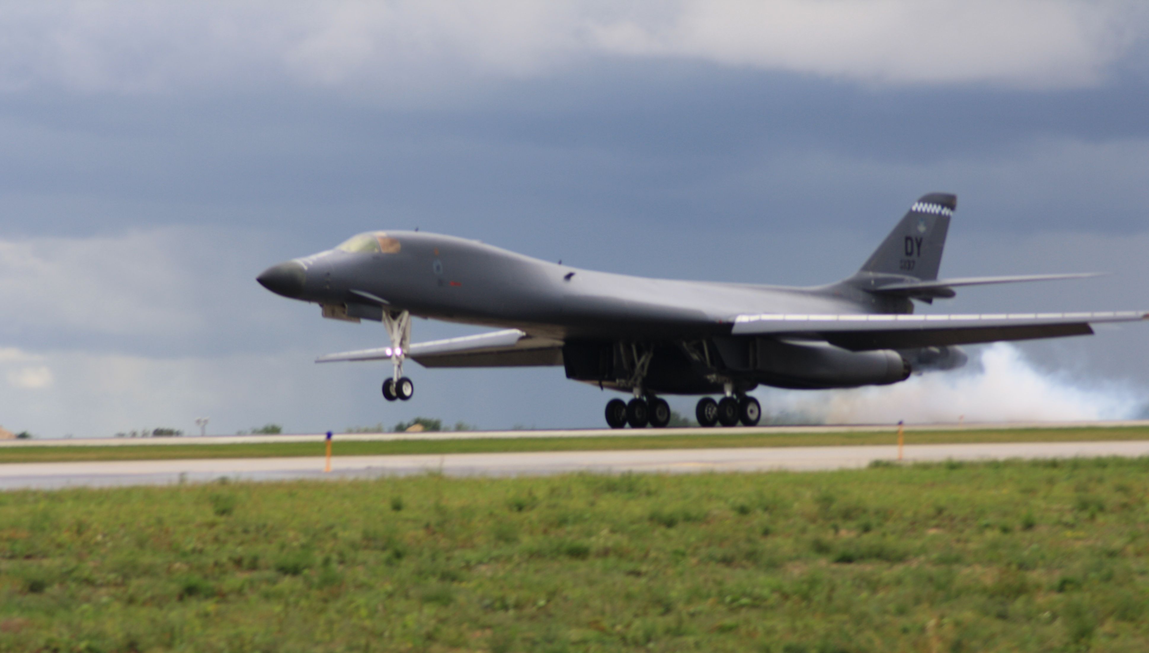 — — - B-1 Lancer landing at KRFD  8-21-2009    Photo taken by Rickie Traeger  TriggerPhotography@Gmail.com