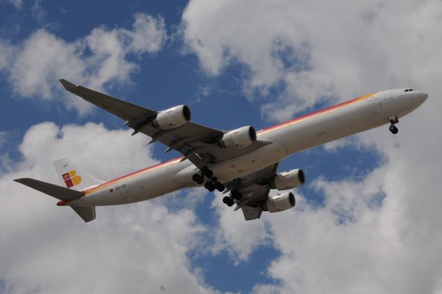 Airbus A340-600 (EC-IZX) - Short final for runway 10-R at KORD on 07-23-13