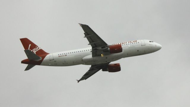 Airbus A320 (N843VA) - Departure 12R, South to KLAX, Overcast rainy day