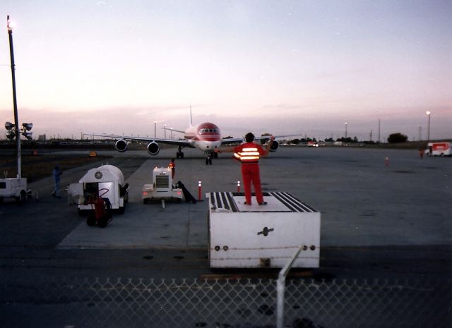 McDonnell Douglas DC-8-70 (N961R) - KSJC - cut rate cargo ramp at SJC in 1988. I could park in the parking lot where I took this photo from and I could feel the air suck from the big 4 PW as this jet idled in. Weird feeling. Dec 1988.