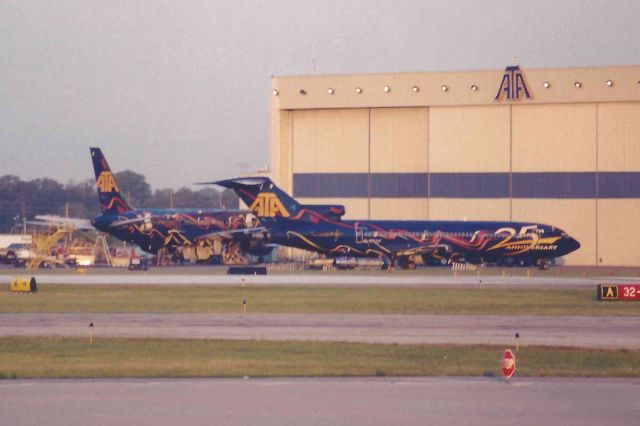 BOEING 727-200 (N772AT) - Both 25th Anniversary birds on the IND hanger ramp. N520AT & N772AT.
