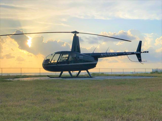 Robinson R-44 (N508HS) - On the helipad at FL18 in Ruskin, FL  (Sunset Grill at Little Harbor)