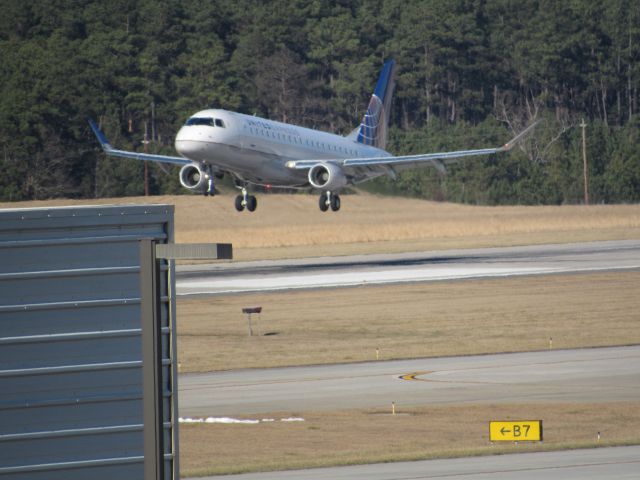 Embraer 170/175 (N119SY) - United Express (Skywest) flight 5592 from Denver Intl, an Embraer 175 landing on runway 23R. This was taken January 30, 2016 at 3:15 PM.