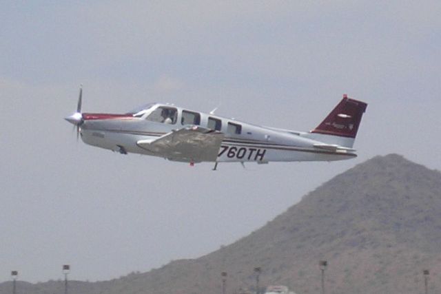 Beechcraft Bonanza (36) (N760TH) - Beechcraft G36 Bonanza departing DVT for its new home at HPN.