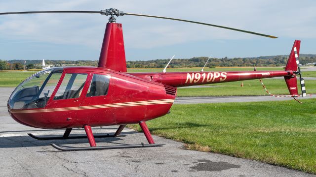 Robinson R-44 (N910PS) - N910PS chilling on the ramp at Frederick Municipal Airport