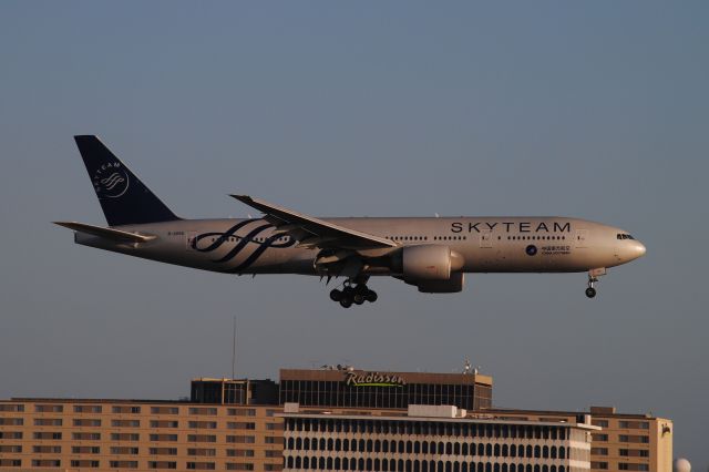 Boeing 777-200 (B-2056) - The SKYTEAM livery on this 777-200ER of China Southern is shown nicely in p.m. light!