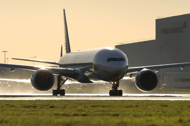 BOEING 777-300 — - Lining up for departure from LHR.