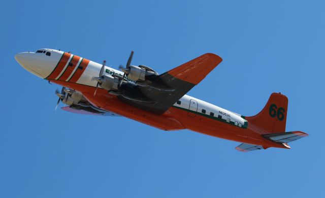 Douglas DC-7 (N6353C) - Departing the Rogue Valley International–Medford Airport for Chico, CA.