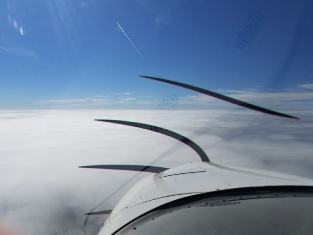 Cirrus SR-22 (N975PW) - Same altitude,  11,000 MSL on Top going to Key West looking forward. 