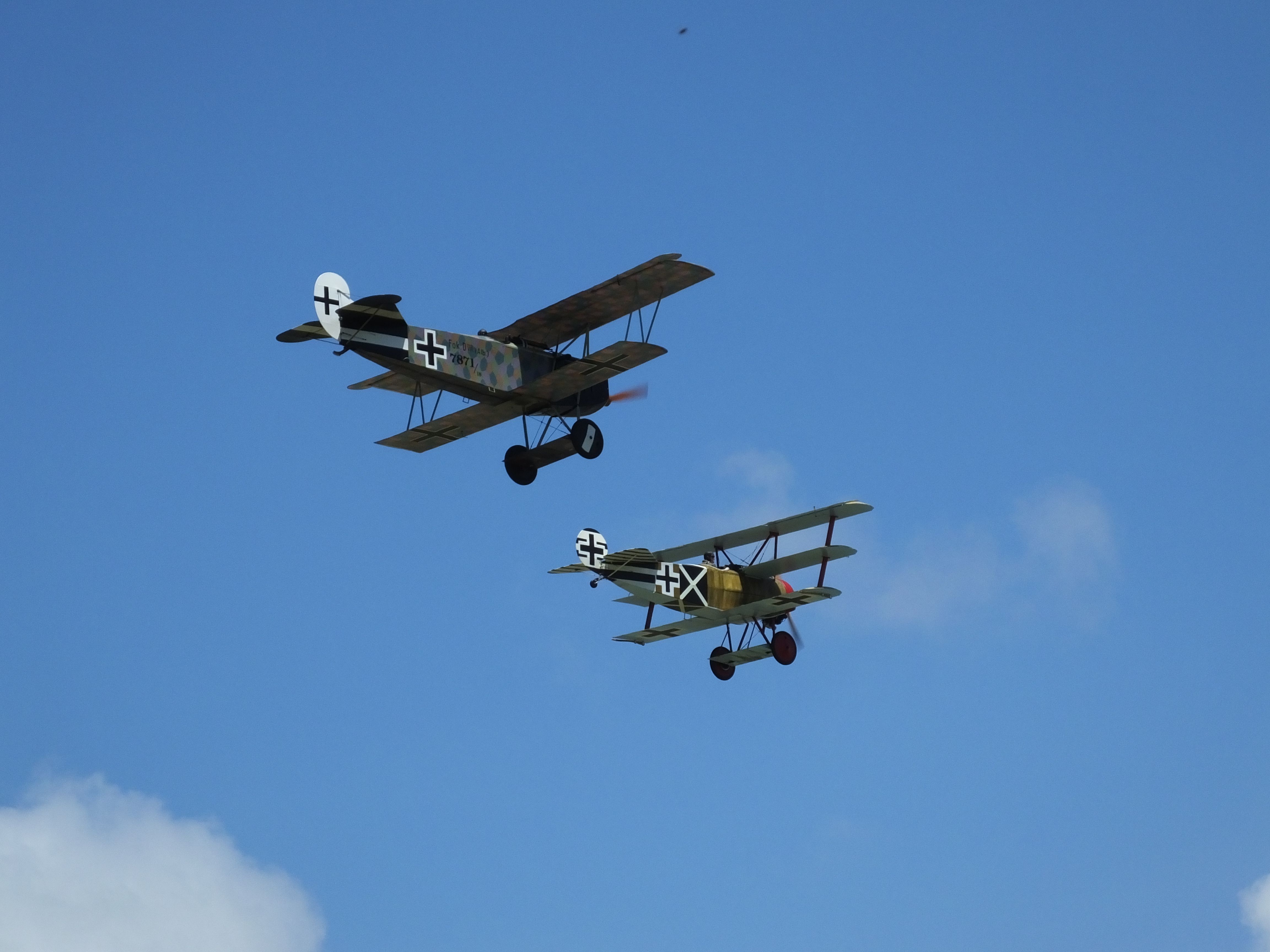 — — - Fokker DVII Albatross and Fokker DR.I Triplane on 25 Jan 2014, practice day for Tauranga Airshow.