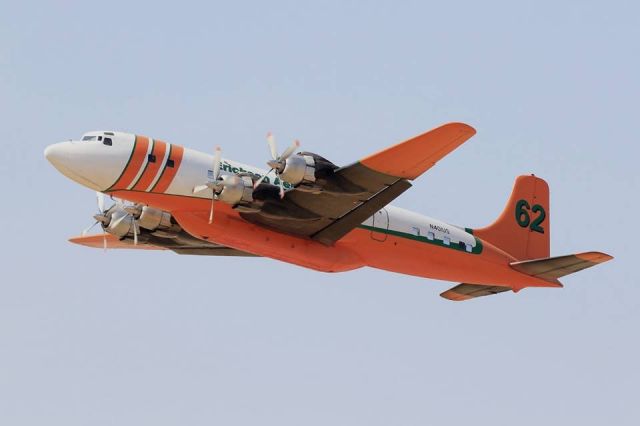 Douglas DC-7 (N401US) - One of Erickson’s three DC-7 firefighting aircraft taking off to fight the Santa Rose firestorm of October, 2017.
