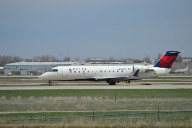 Canadair Regional Jet CRJ-200 (N438SW) - N438SW rolling out after landing in KFSD on Runway 33.