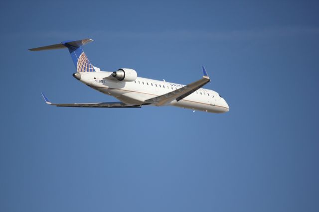 Canadair Regional Jet CRJ-700 (N727SK) - Departing 34R