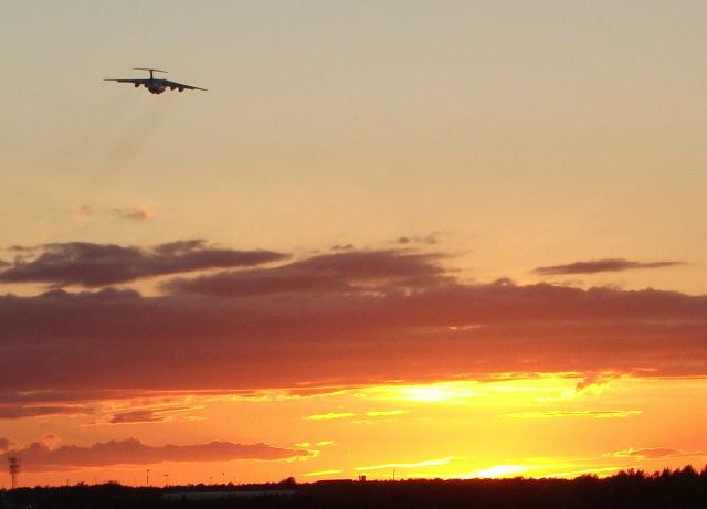 — — - IL-76 taking off into the sunset