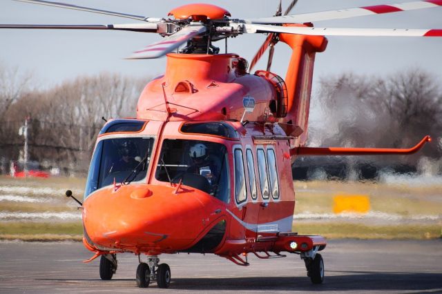 BELL-AGUSTA AB-139 (C-GYNH) - Year: 2010br /Make: AgustaWestlandbr /Model: AW139br /Opby: ORNGE Airbr /br /AgustaWestland AW139 operated by ORNGE Air taxiing out from the FBO at the Buffalo Niagara International Airport before heading to Coatesville PA for new paint