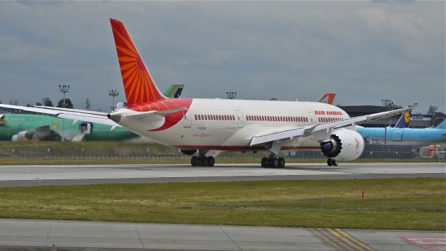 Boeing 787-8 (VT-AND) - BOE233 (LN:29) begins its takeoff roll on runway 16R for a flight to KCHS on 7/2/12. The aircraft is using a Boeing temporary registration #N10230.