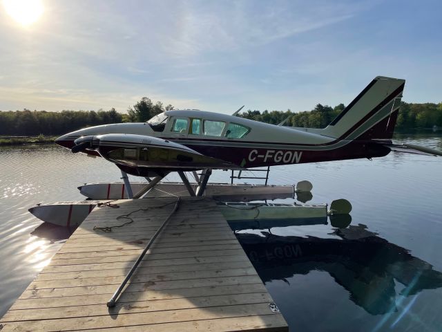 Piper Apache (C-FGON) - Fist time in the water after Nomad conversion and float installation.br /Aircraft was moved 2kms up a road from airport to lake.