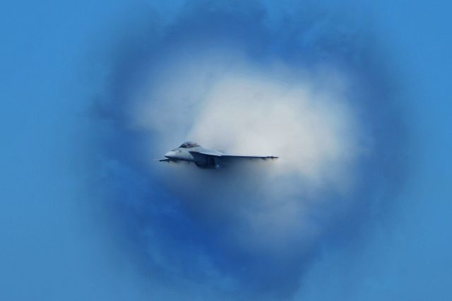 — — - U.S.Navy F/A-18F Super Hornet on high speed pass making the wall.