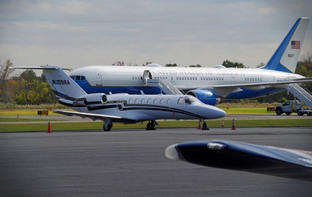 Cessna Citation CJ3 (N255RA) - MORRISTOWN, NEW JERSEY, USA-OCTOBER 01, 2020: Seen parked at Morristown Municipal Airport was this 2006 Cessna 525B Citation CJ3 corporate jet. Behind her is parked Air Force One which landed on Runway 23 approximately one hour earlier with President Trump on board for a short campaign stop at his golf club in nearby Bedminster, New Jersey. When flying into or out of Morristown Airport, the Air Force uses the Boeing 757-200 as Air Force One, instead of the larger 747, because of shorter runways at Morristown.