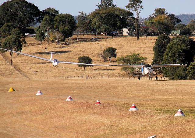 VH-BGE — - Sequence showing Cessna 150 tug tow launch at Boonah Queensland. Tug has 180hp engine.Glider is Schleicher ASK 21 of Boonah club