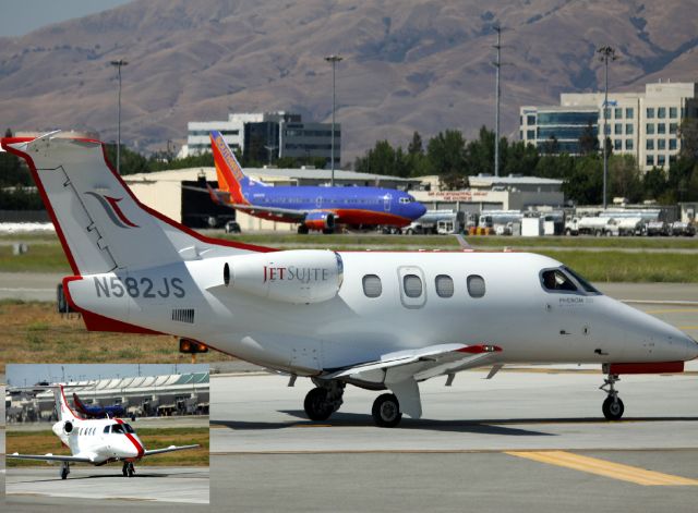 Embraer Phenom 100 (N582JS) - Awaiting Departure at 30L, to KRNO. 07-17-2014