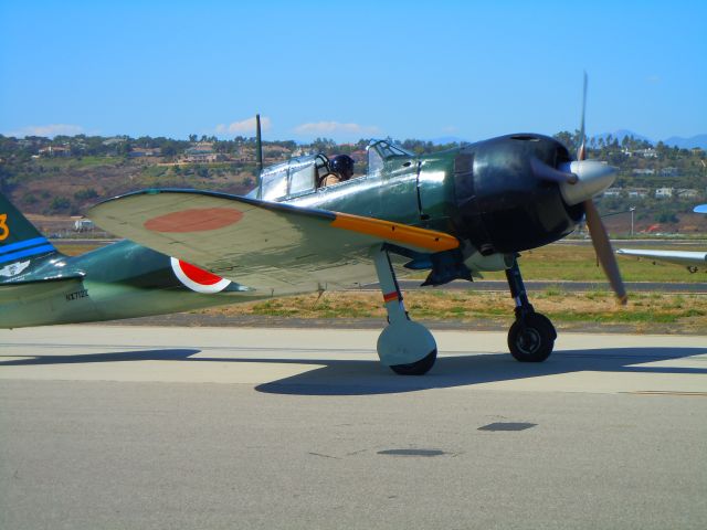 Mitsubishi A6M Zero — - Japanese Zero taxiing at Camarillo airport airshow 8/21/10 (Very rare and real except for the American engine and prop)