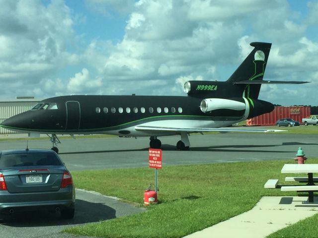 Dassault Falcon 900 (N999EA) - N999EA seen from the terminal of KLCQ.