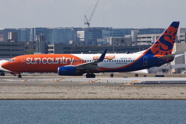 Boeing 737-800 (N838SY) - Sun Country B738 with '40 Years in Flight' markings departing BOS on 8/26/22.