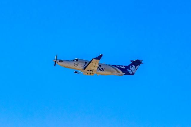 Pilatus PC-12 (N493SA) - Southern Airways Express PC12 taking off from PHX on 11/6/22. Taken with a Canon 850D and Tamron 70-200 G2 lens.