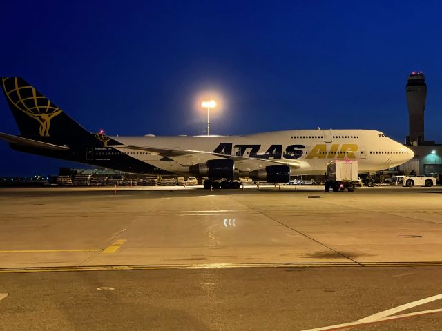 Boeing 747-200 (N480MC) - As day breaks..N480MC began’s to slowly wake up as service arrives.