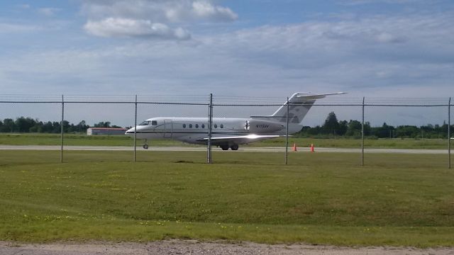 Hawker Beechcraft 4000 (N119AK) - Flew in Band for Boots and Hearts concert. 