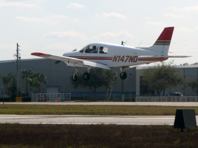 Piper Cherokee Arrow (N147ND) - Landing runway 15.