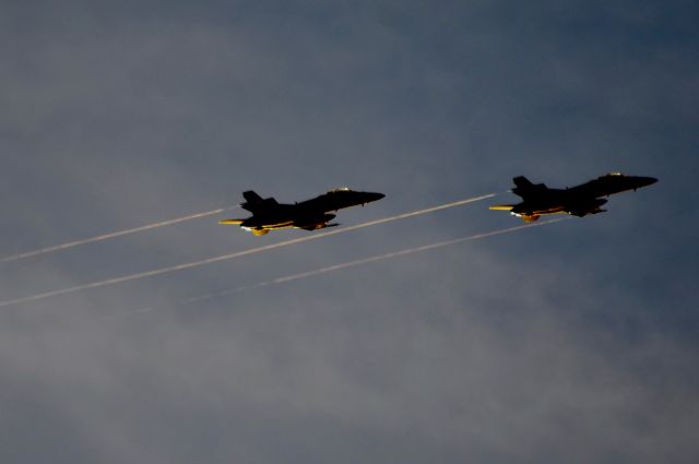 McDonnell Douglas FA-18 Hornet — - streamers  coming of the wings of these two growlers on approach to Anderson.