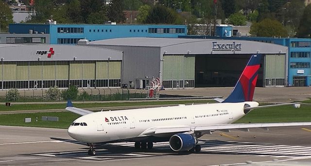 Airbus A330-200 (N855NW) - Delta A330-200 taking off from Zurich. Not a regular find there!