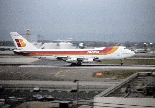 Boeing 747-200 (EC-DNP) - KLAX- Mar 1989 view from Imperial Hill, -DNP arriving on 7R on a cold March 89 evening from overseas.