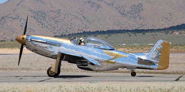 North American P-51 Mustang (N551MB) - Another snap taken during the first day of the 2019 Pylon Racing Seminar at Reno Stead (KRTS). This pic captured Mike Brown's ultra-gorgeous gold and polished silver "Goldfinger" (formerly named "Risky Business") as it is taxiing to the RARA ramp after a noon hour practice run around the Unlimited Course. br /"Goldfinger" still wears its "Race 2" number from last year's Air Races and there is absolutely no doubt it will be "Race 2" in this year's Unlimited races.