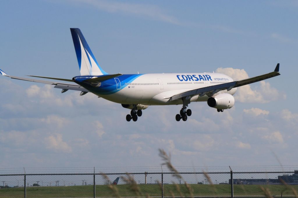 Airbus A330-300 (F-HSKY) - Arriving from Paris on runway 24R