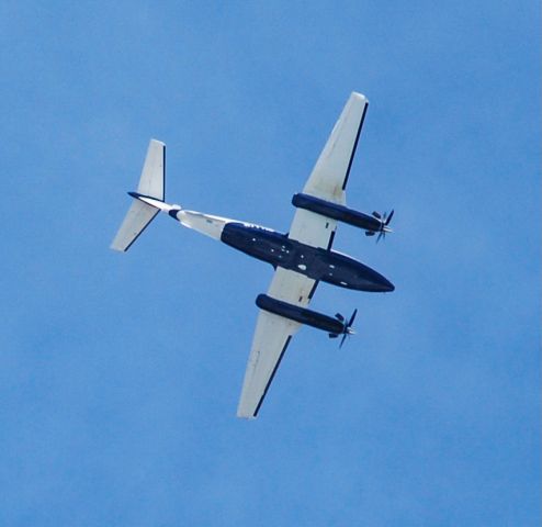 Beechcraft King Air 90 (N777HF) - Coming in over Fort Walton Beach.  4/3/21.