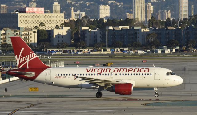 Airbus A319 (N528VA) - Taxiing to gate at LAX