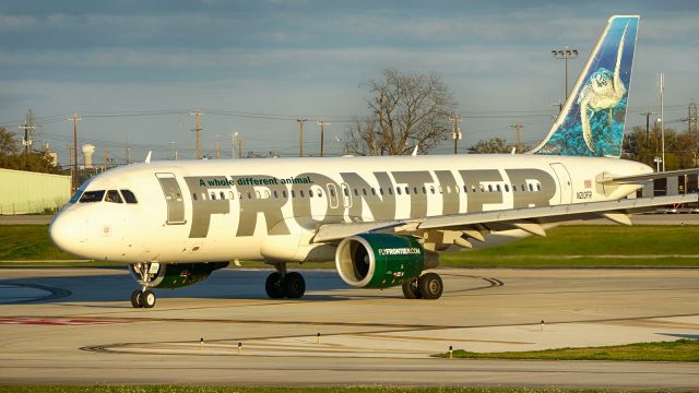 Airbus A320 (N210FR) - Exiting 4 at N6 after arrival just before sunset, Feb.2020. Looks like that front door came of a A319 of theirs? 