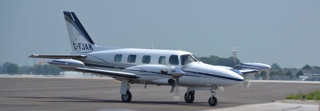 Piper Cheyenne 2 (C-FJAK) - A "Piper Cheyenne 2" taxing at "Windsor International Airport".