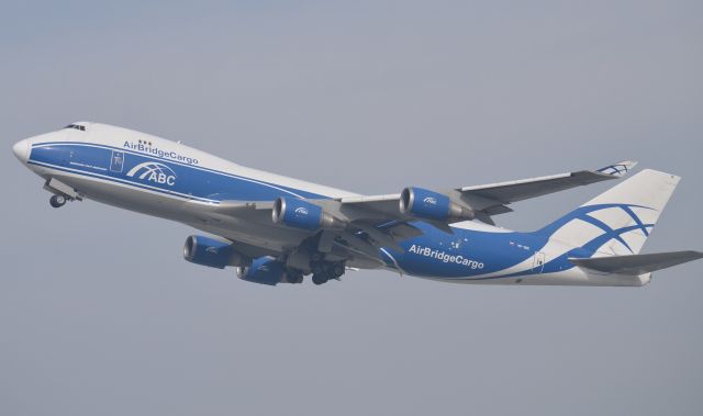 Boeing 747-400 (VP-BIK) - An Air Bridge Cargo 747-400 captured just after departure from runway 25R at LAX. Unfortunately there was a ton of haze on the day that I snapped this and most of the pictures that I got just looked terrible and not presentable, but this one (while still not as good as I would have like because of all the haze) wasnt too bad and since I dont have any snaps of this airline yet I figured I would upload it.